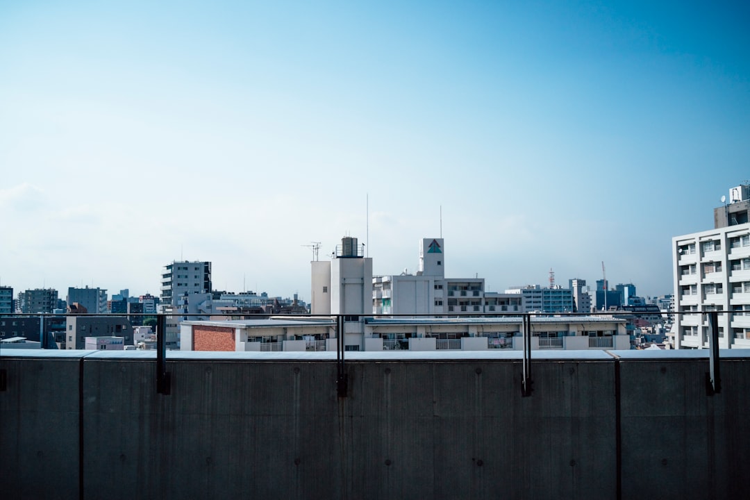 city buildings under blue sky